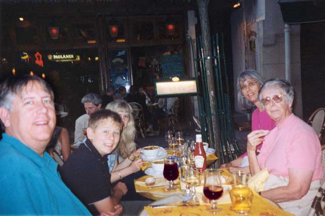 McQueen family at Parisian sidewalk caf