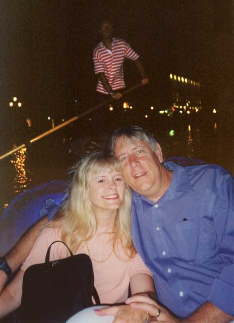 Nancy McQueen and Jim McQueen riding in a Venice Gondola