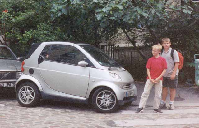 Scott McQueen and Sean McQueen snicker at Smart Car